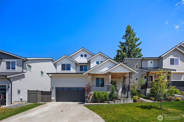 8009 197th Ave E, Bonney Lake, WA 98391 - craftsman inspired home featuring a garage, concrete driveway, a front yard, and a porch