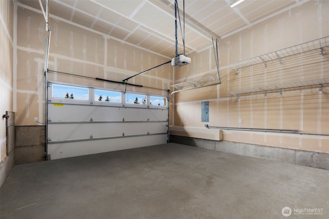 8009 197th Ave E, Bonney Lake, WA 98391 - garage featuring electric panel and a garage door opener