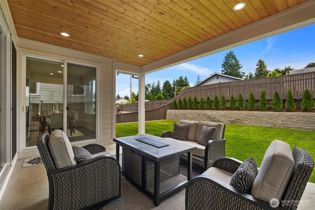 8009 197th Ave E, Bonney Lake, WA 98391 - fenced backyard featuring an outdoor hangout area and a patio area