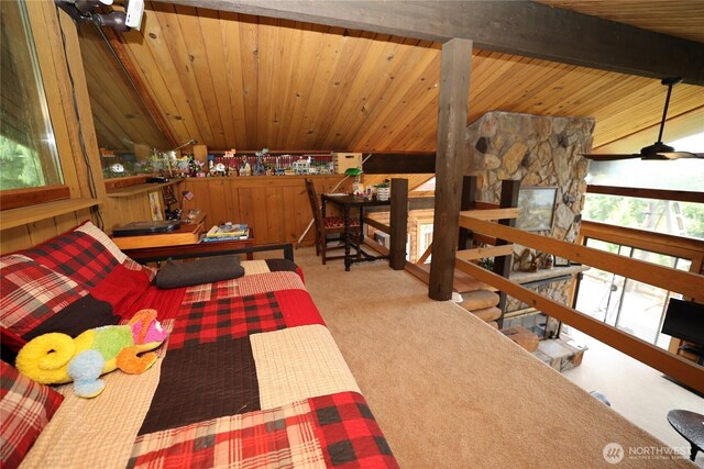 209 Marine Dr, Blakely Island, WA 98222 - carpeted bedroom featuring wooden walls, wooden ceiling, and multiple windows