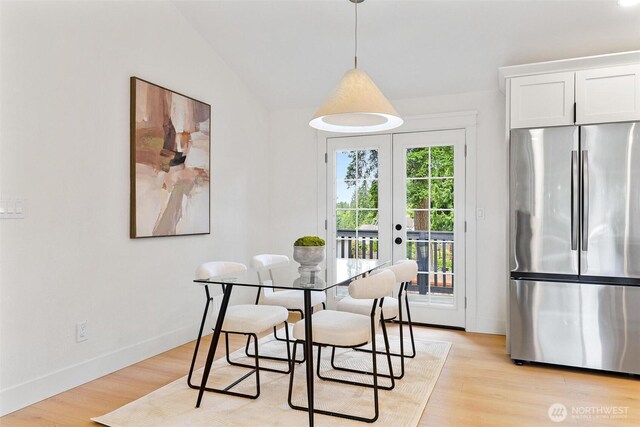 236 S 316th Pl, Federal Way, WA 98003 - dining space featuring light wood-style floors, french doors, and baseboards