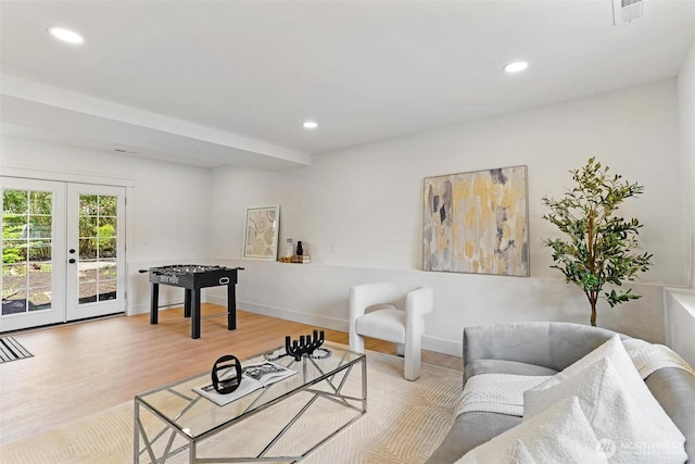 236 S 316th Pl, Federal Way, WA 98003 - living room featuring recessed lighting, french doors, and wood finished floors