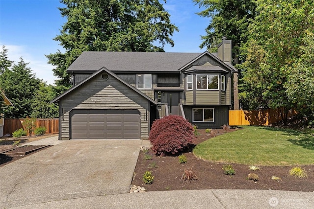 236 S 316th Pl, Federal Way, WA 98003 - raised ranch with driveway, a chimney, an attached garage, and a shingled roof