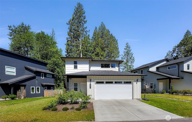 2912 Sandwood Ln, Blaine, WA 98230 - view of front facade with board and batten siding, driveway, a front yard, roof with shingles, and an attached garage