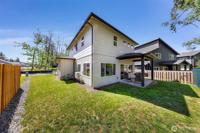 2912 Sandwood Ln, Blaine, WA 98230 - back of property featuring board and batten siding and a patio