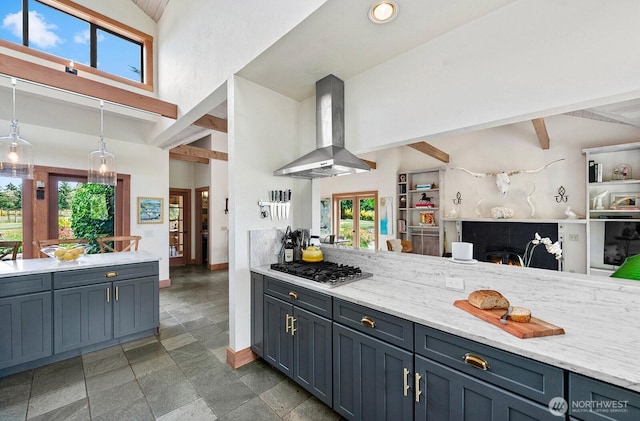 26742 94th Ave SW, Vashon, WA 98070 - kitchen with extractor fan, stainless steel gas stovetop, high vaulted ceiling, baseboards, and open floor plan