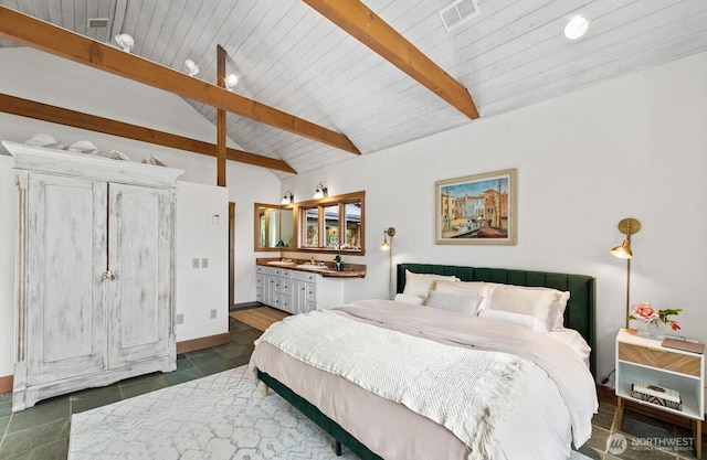 26742 94th Ave SW, Vashon, WA 98070 - bedroom with dark tile patterned floors, wood ceiling, and baseboards