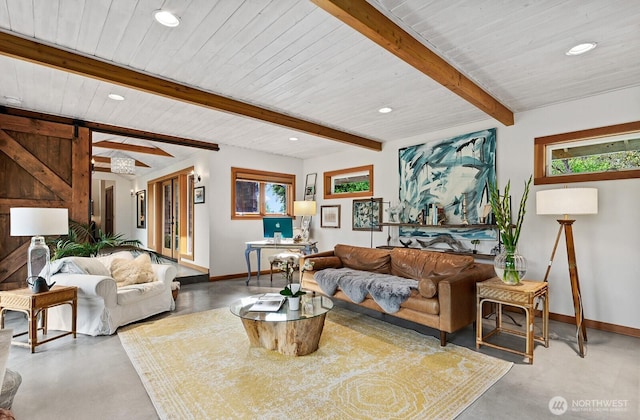 26742 94th Ave SW, Vashon, WA 98070 - living area featuring finished concrete floors, baseboards, recessed lighting, a barn door, and wood ceiling with exposed beams