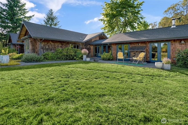 26742 94th Ave SW, Vashon, WA 98070 - view of front of property featuring french doors, a front lawn, and a shingled roof
