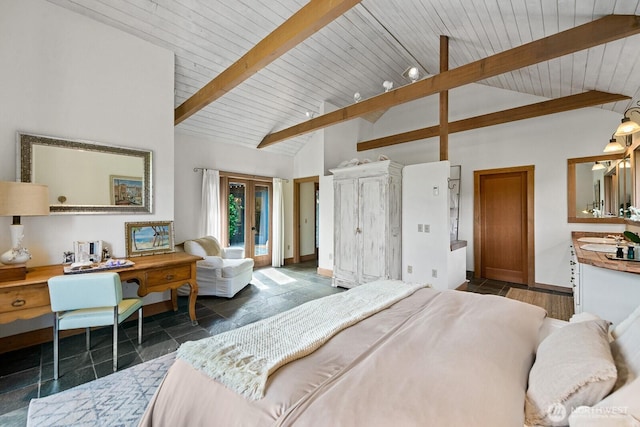 26742 94th Ave SW, Vashon, WA 98070 - bedroom with access to exterior, stone tile flooring, wood ceiling with exposed beams, baseboards, and high vaulted ceiling