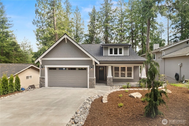 19 Inglewood Pl, Bellingham, WA 98229 - craftsman inspired home with concrete driveway, a garage, stone siding, and a shingled roof