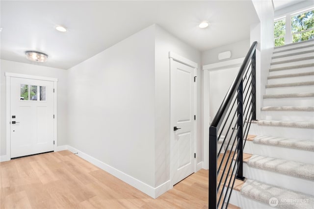 19 Inglewood Pl, Bellingham, WA 98229 - entrance foyer with light wood-type flooring, baseboards, stairway, healthy amount of natural light, and recessed lighting