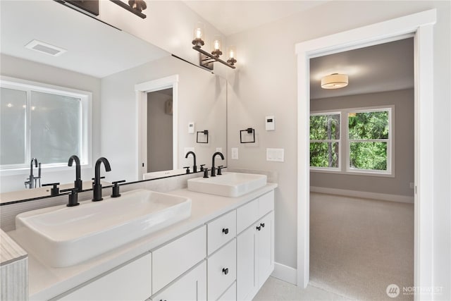 19 Inglewood Pl, Bellingham, WA 98229 - bathroom featuring double vanity and baseboards