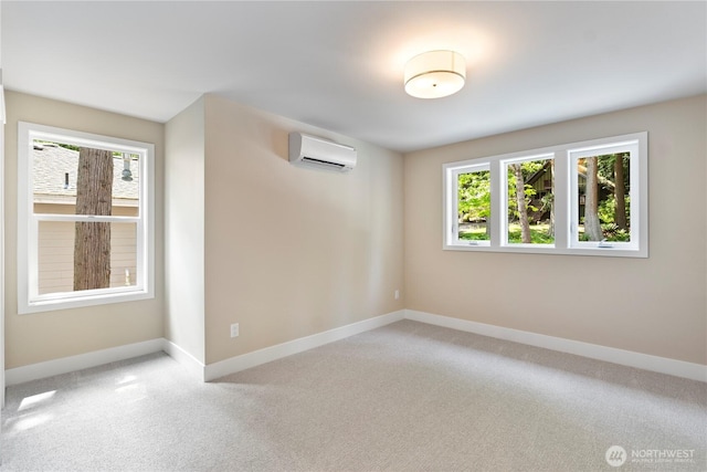 19 Inglewood Pl, Bellingham, WA 98229 - spare room with a wall mounted air conditioner, baseboards, and light colored carpet