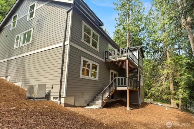 19 Inglewood Pl, Bellingham, WA 98229 - rear view of house with ac unit, a wooden deck, and stairs