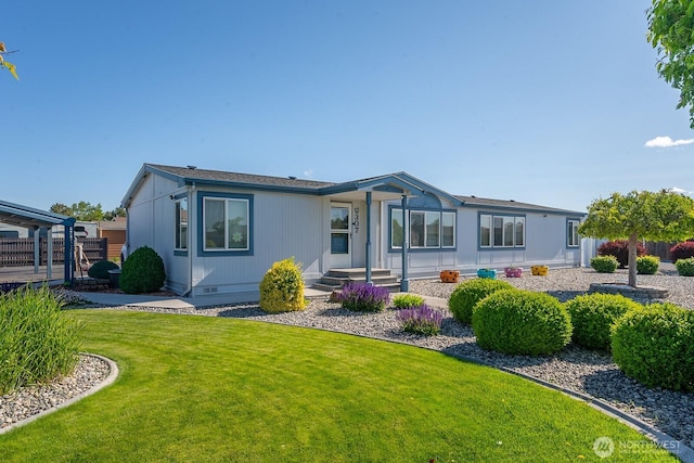 307 Hilltop Cir, Ephrata, WA 98823 - rear view of property with a yard and crawl space