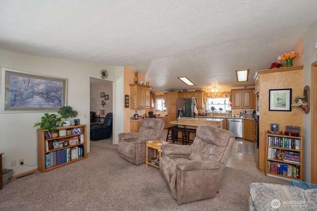 307 Hilltop Cir, Ephrata, WA 98823 - living area with a textured ceiling and light carpet