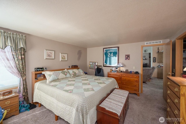 307 Hilltop Cir, Ephrata, WA 98823 - carpeted bedroom featuring a textured ceiling