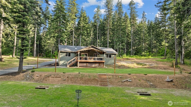 1091 Big Horn Way, Cle Elum, WA 98922 - rear view of property with stairway, a wooden deck, a lawn, and a wooded view