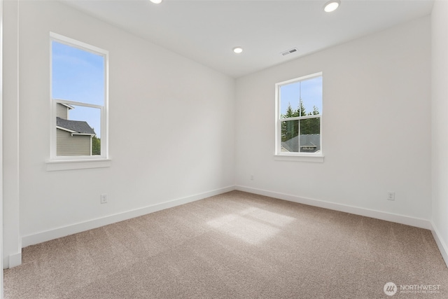 15706 210th Ave E Unit 312, Bonney Lake, WA 98391 - empty room with carpet, baseboards, and recessed lighting