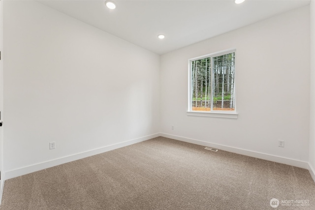 15706 210th Ave E Unit 312, Bonney Lake, WA 98391 - carpeted spare room featuring baseboards and recessed lighting
