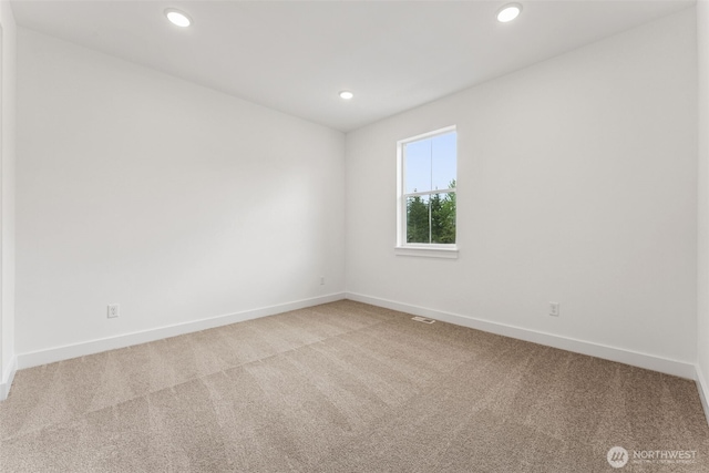 15706 210th Ave E Unit 312, Bonney Lake, WA 98391 - carpeted empty room with baseboards and recessed lighting