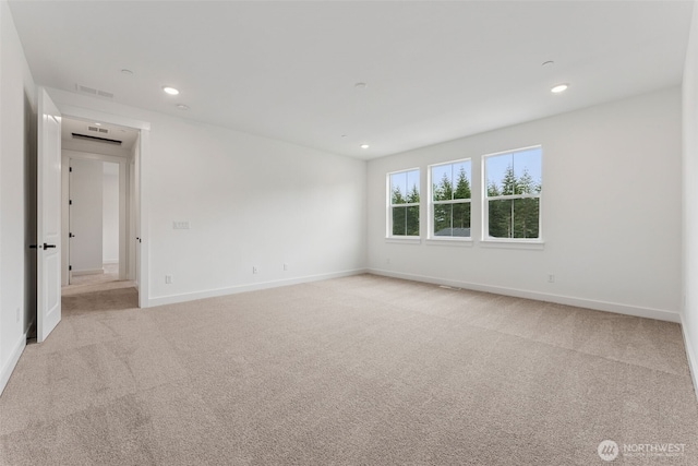 15706 210th Ave E Unit 312, Bonney Lake, WA 98391 - empty room featuring baseboards, light carpet, and recessed lighting