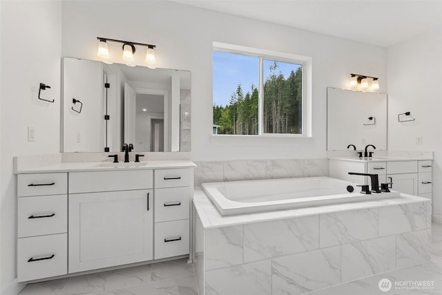 15706 210th Ave E Unit 312, Bonney Lake, WA 98391 - full bath with marble finish floors, vanity, and a garden tub