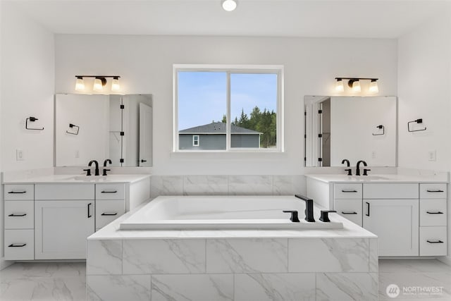 15706 210th Ave E Unit 312, Bonney Lake, WA 98391 - full bath featuring two vanities, marble look tile flooring, and a garden tub