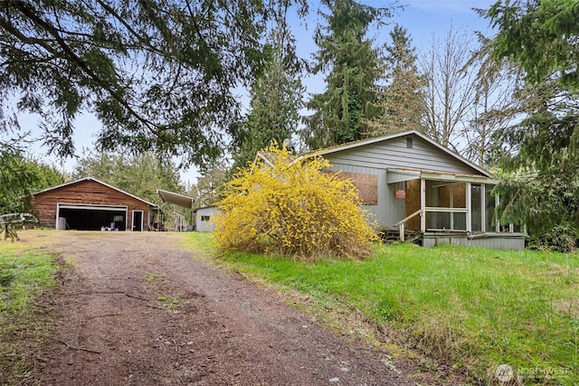 15421 50th Ave E, Tacoma, WA 98446 - view of front of property with a detached garage and an outdoor structure