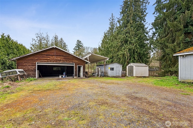 15421 50th Ave E, Tacoma, WA 98446 - garage with a storage shed and a detached garage