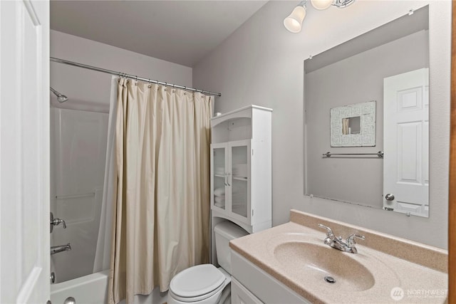 340 W Beach Dr, Orondo, WA 98843 - bathroom featuring vanity, toilet, and shower / bathtub combination with curtain