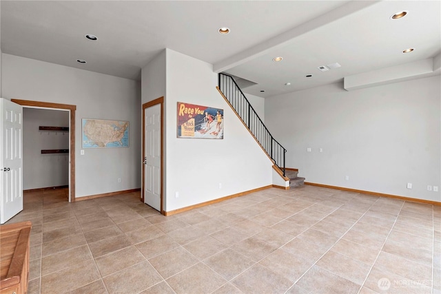 340 W Beach Dr, Orondo, WA 98843 - spare room featuring recessed lighting, light tile patterned floors, stairs, and baseboards