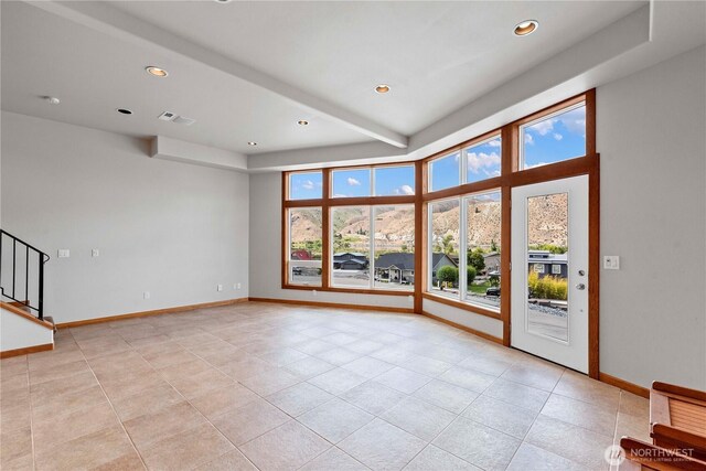 340 W Beach Dr, Orondo, WA 98843 - spare room featuring baseboards, recessed lighting, stairs, and light tile patterned flooring