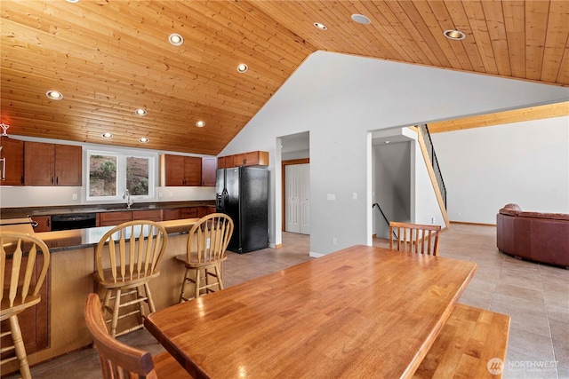 340 W Beach Dr, Orondo, WA 98843 - dining room with recessed lighting, wood ceiling, light tile patterned floors, and high vaulted ceiling