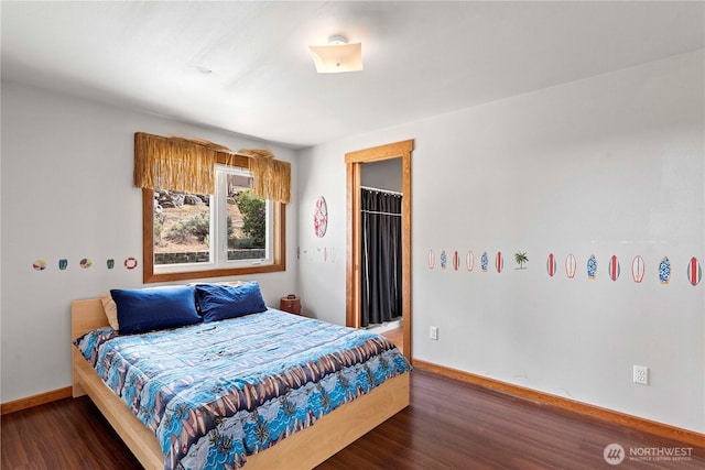 340 W Beach Dr, Orondo, WA 98843 - bedroom with wood finished floors and baseboards