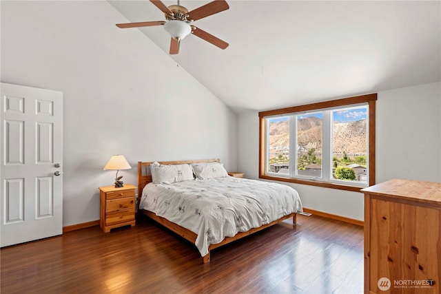 340 W Beach Dr, Orondo, WA 98843 - bedroom with vaulted ceiling, baseboards, dark wood finished floors, and a ceiling fan