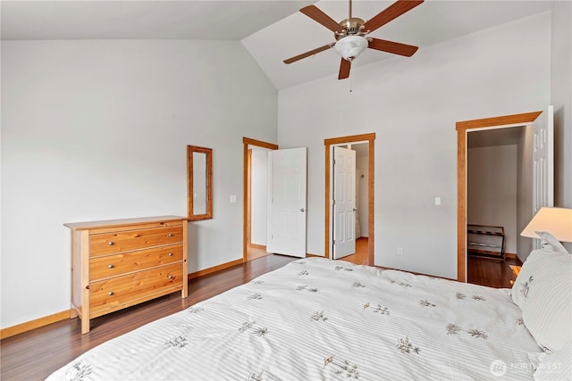 340 W Beach Dr, Orondo, WA 98843 - bedroom with high vaulted ceiling, wood finished floors, baseboards, and a ceiling fan