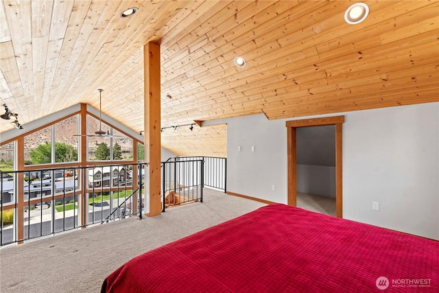 340 W Beach Dr, Orondo, WA 98843 - unfurnished bedroom with lofted ceiling, carpet floors, and wood ceiling