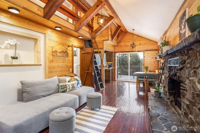 451 Aspen Springs Rd, Cle Elum, WA 98922 - living area featuring wooden walls, wood-type flooring, and a fireplace