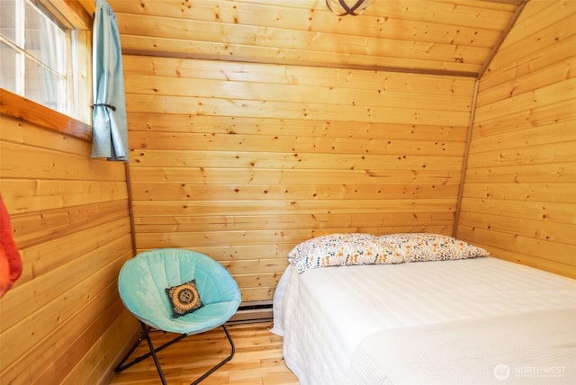 451 Aspen Springs Rd, Cle Elum, WA 98922 - bedroom with wood finished floors, wooden walls, vaulted ceiling, and wooden ceiling