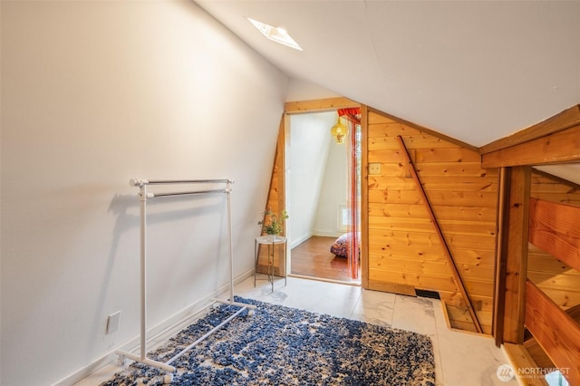 451 Aspen Springs Rd, Cle Elum, WA 98922 - bonus room with vaulted ceiling, marble look tile flooring, and a skylight