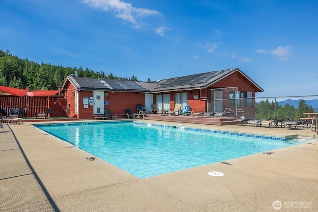 451 Aspen Springs Rd, Cle Elum, WA 98922 - community pool featuring a patio area and a mountain view