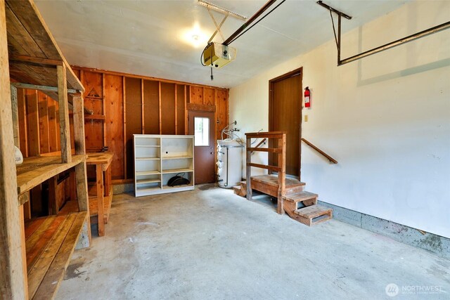 247 Bass Ave NE, Ocean Shores, WA 98569 - garage with a garage door opener
