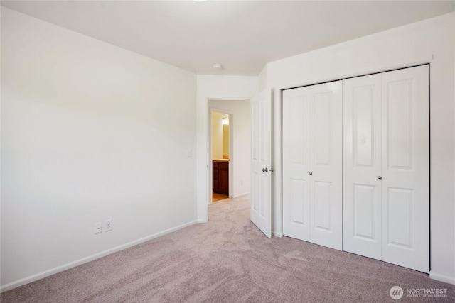 4825 E Q St Unit 2922, Tacoma, WA 98404 - unfurnished bedroom featuring carpet, baseboards, and a closet