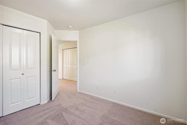 4825 E Q St Unit 2922, Tacoma, WA 98404 - unfurnished bedroom featuring carpet flooring, baseboards, and a closet
