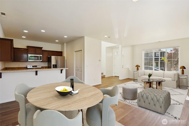 4825 E Q St Unit 2922, Tacoma, WA 98404 - dining room featuring light wood-style flooring, recessed lighting, and baseboards