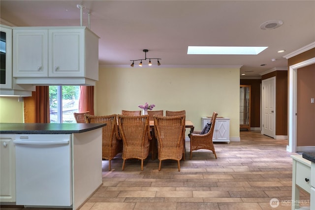 245 Shady Glen Ave, Point Roberts, WA 98281 - dining space with ornamental molding, a skylight, light wood-style floors, and recessed lighting