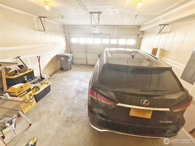 2648 Erwin Ave, Dupont, WA 98327 - garage featuring a garage door opener