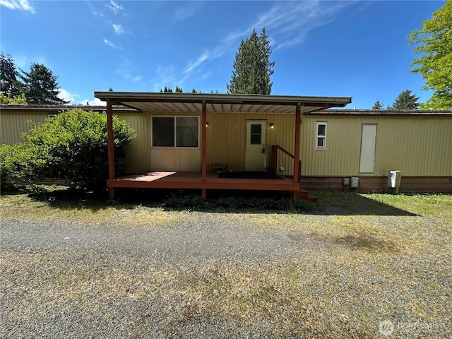 11615 Nisqually Park Loop SE, Olympia, WA 98513 - back of property with a wooden deck